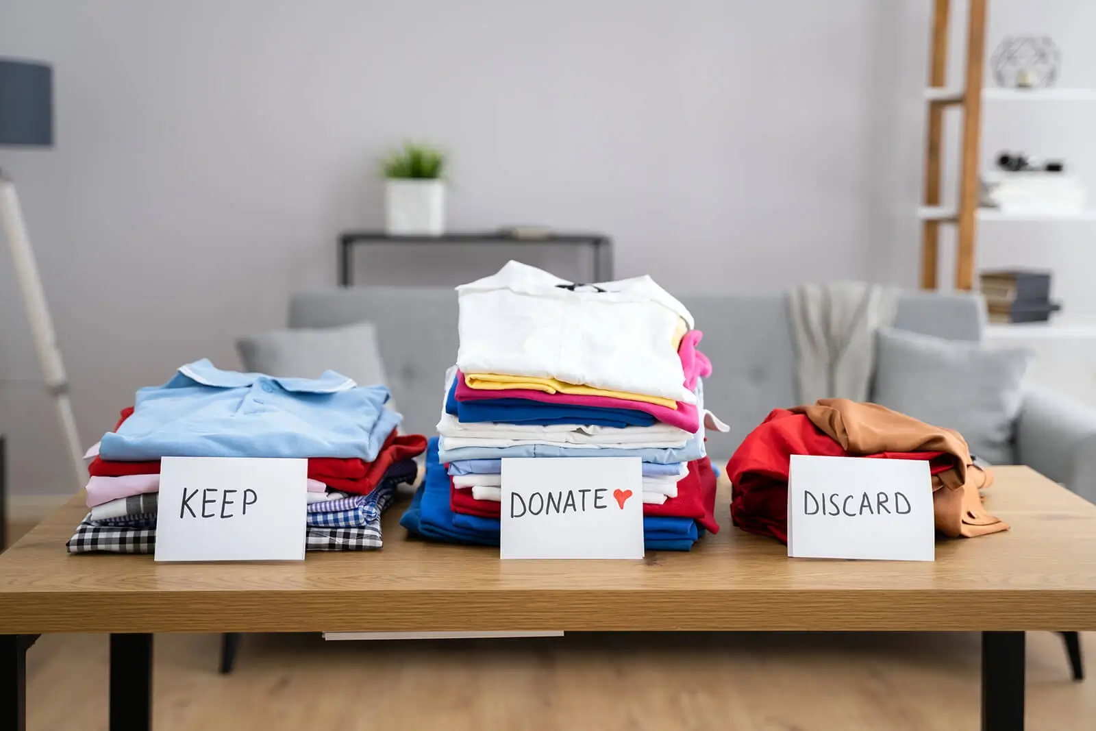 Piles of clothes for keeping or donating